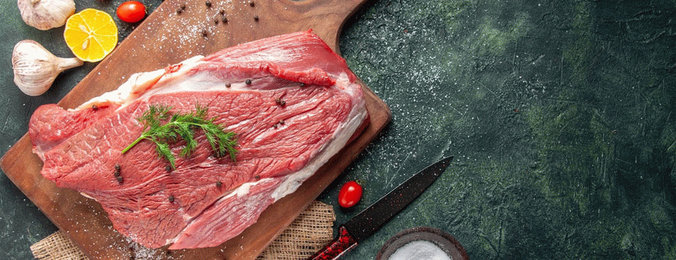 Fresh Raw Red Meat Garlics on Wooden Cutting Board